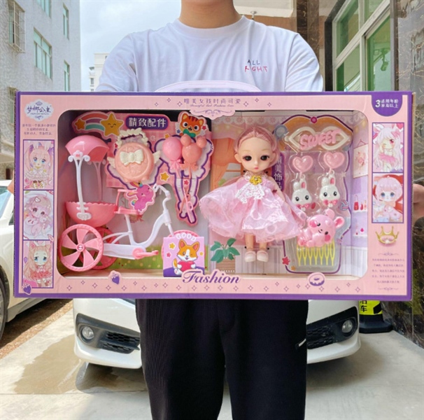 đồ chơi búp bê chạy xe đạp