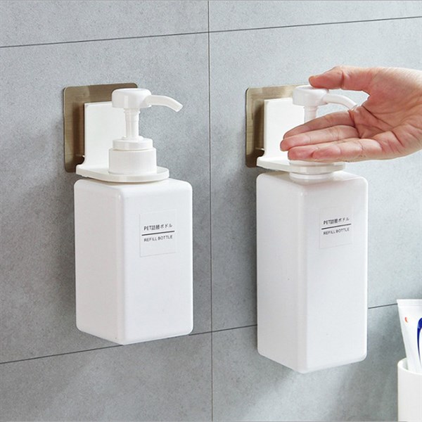 dụng cụ đỡ cổ chai dầu gội, sữa tắm dán tường